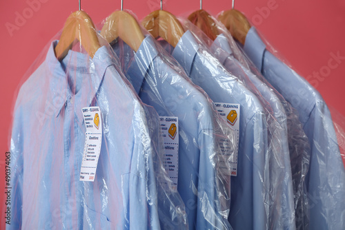 Rack with clean blue shirts...