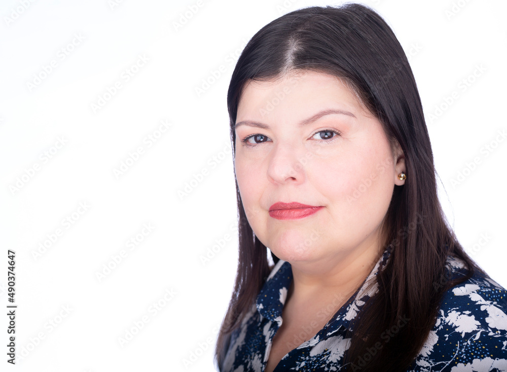Headshot closeup of a beautiful latin lady. She is standing on the side over a white background and is serious. Headshot closeup of a beautiful latin lady. She is standing on the side over a white background and is serious.