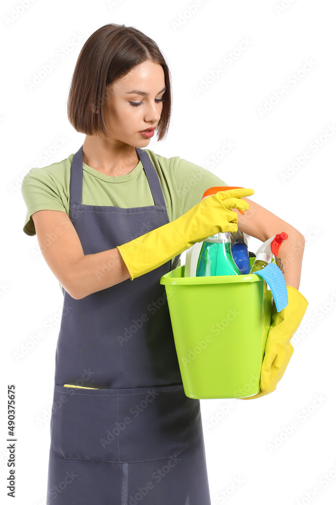 Beautiful young woman with cleaning supplies on white background Beautiful young woman with cleaning supplies on white background