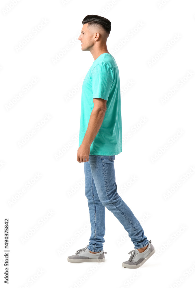 Fototapeta premium Handsome young man in stylish t-shirt isolated on white