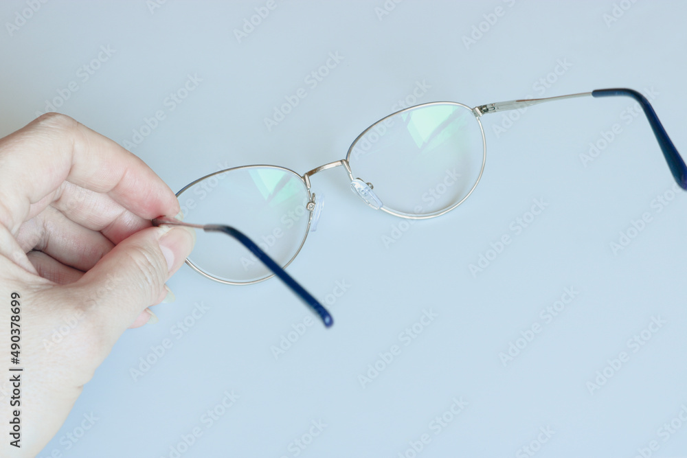 Glasses in female hands, copy space template, banner. Glasses in female hands, copy space template, banner.