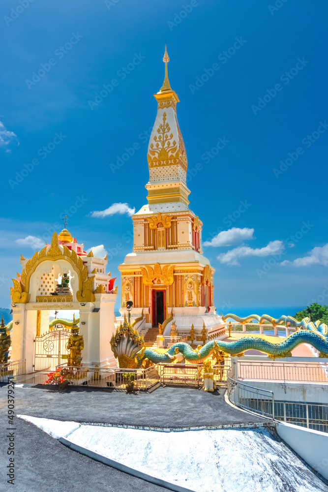 Naklejka premium Buddah temple with beautiful views from top of mountain of Patong Phuket Thailand. 