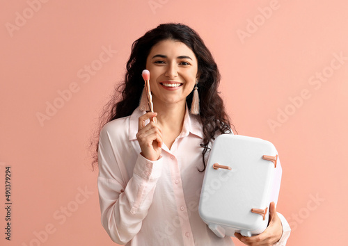 Beautiful young woman with ...