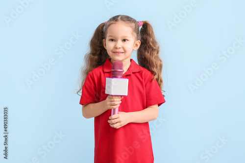 Cute little girl with micro...