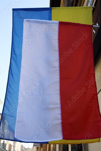 Fototapeta Naklejka Na Ścianę i Meble -  Flags of Poland and Ukraine hang together