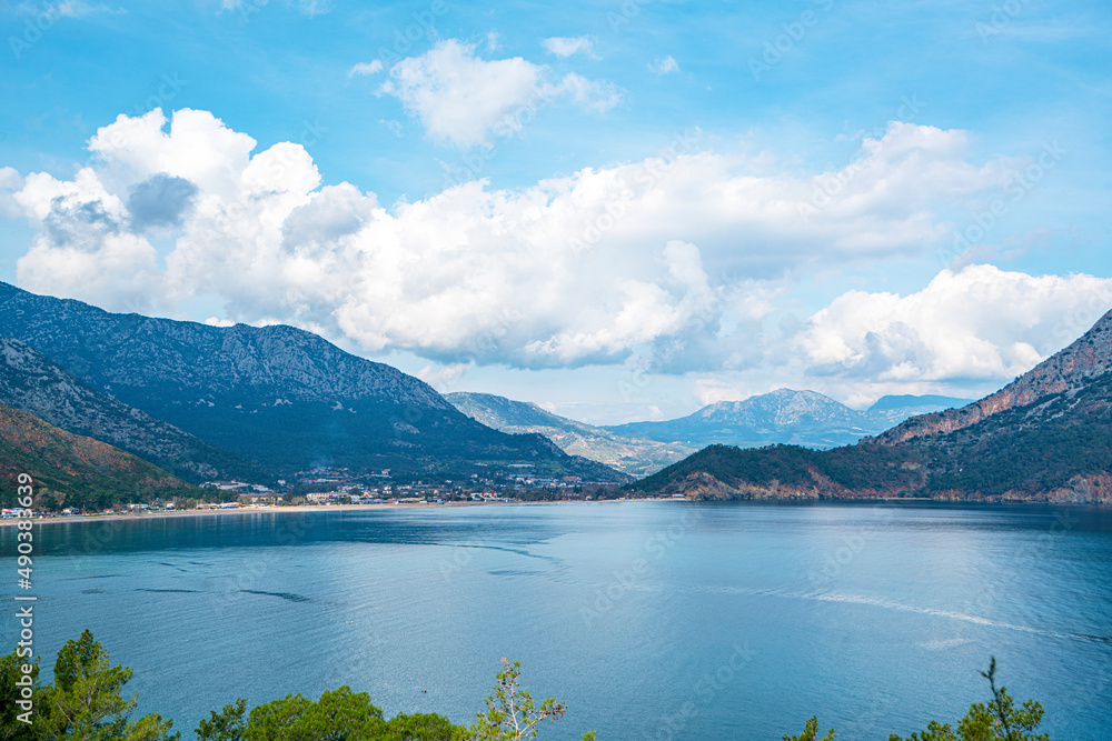 The Bay of Adrasan extends along more than 2.5 km of Antalya, naturally protected area, surrounded by a national park with pine forests, Taurus Mountains, blue water lagoons and sandy beaches.