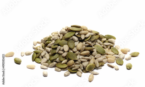 Mix seed, pumpkin seeds, sunflower seeds and pine nuts isolated on white