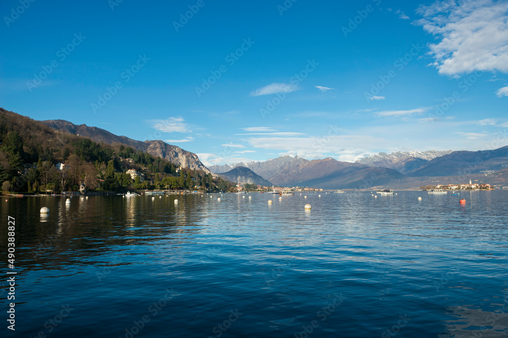 Borromean Islands on Alpine Lake Maggiore with Mountain in a Sunny Day in Stresa, Piedmont in Italy. Borromean Islands on Alpine Lake Maggiore with Mountain in a Sunny Day in Stresa, Piedmont in Italy.