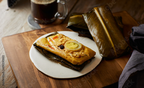Cuadro en lienzo Tamal de pollo is a traditional Ecuadorian appetizer that consists of a tamale filled with shredded chicken