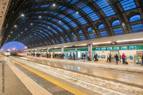 Railroad Station with a Train in Long Exposure in Milan, Lombardy in Italy.