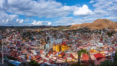 Time lapse view of Guanajuato cityscape including historical landmark Basilica of Our Lady of Guanajuato by day in Guanajuato, Mexico. photo