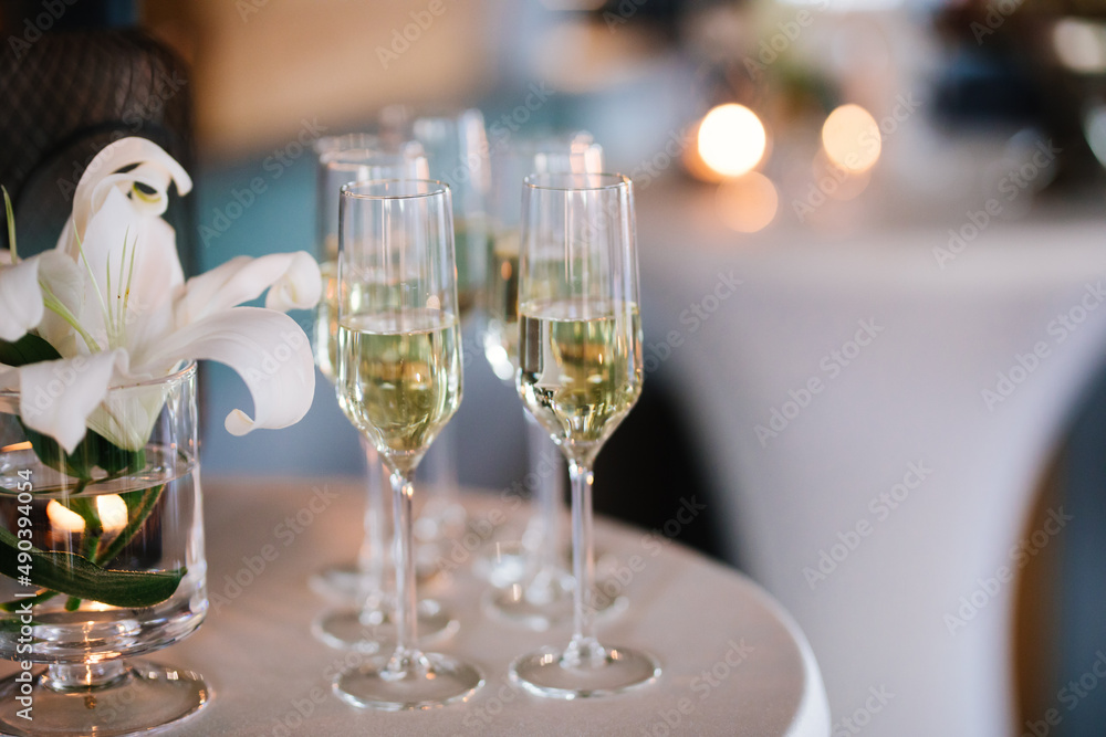 Champagne glasses on a table Champagne glasses on a table
