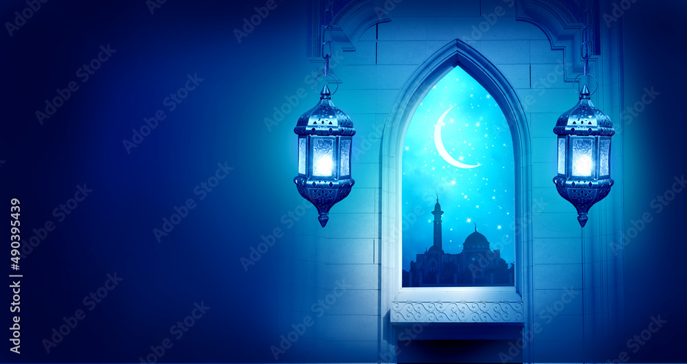 Islamic Greeting Cards for Muslim Holidays. Ramadan Kareem blue background.Eid Mubarak, greeting background with lantern.Mosque window