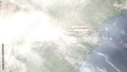 Earth zoom in from outer space to city. Zooming on Posadas, Misiones, Argentina. The animation continues by zoom out through clouds and atmosphere into space. Images from NASA