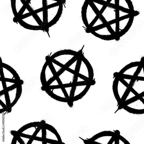 Seamless pattern of sprayed pentagram symbol. Vector illustration with overspray in black over white.