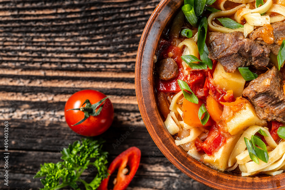 Lagman asian soup. concept of oriental Uzbek cuisine, Food recipe background. Close up Lagman asian soup. concept of oriental Uzbek cuisine, Food recipe background. Close up