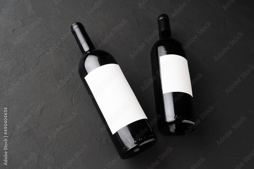 Bottle of Red Wine on a black background. Wine Bottle with Blank Label Mockup Bottle of Red Wine on a black background. Wine Bottle with Blank Label Mockup