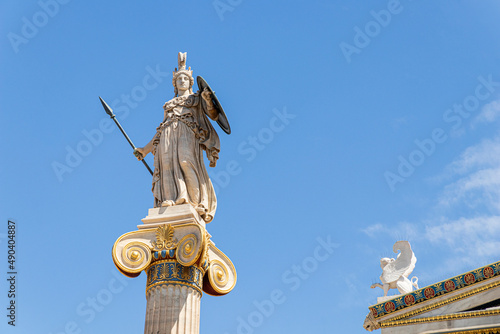 Athens, Greece. Column statue of godess Athena, one of the Olympian deities in classical Greek religion, in the modern Academy of Athens