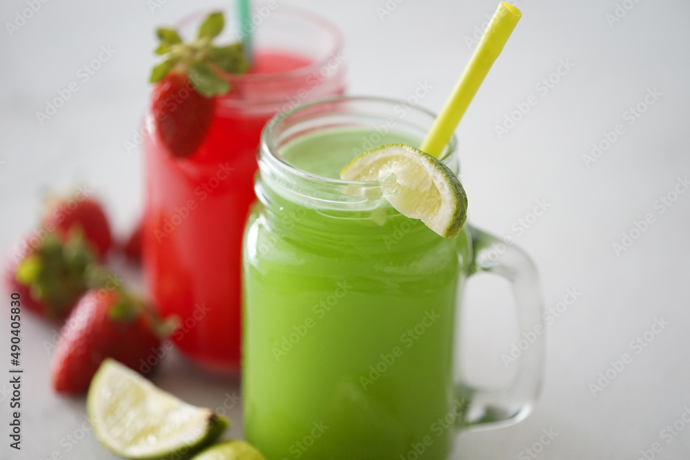 Strawberry juice and kiwi and green lime juice smoothie