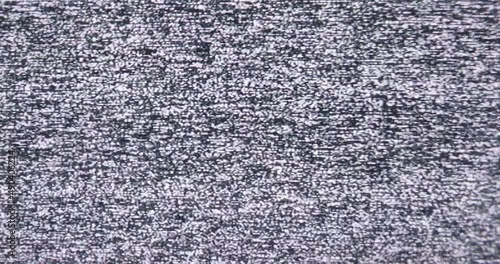 Old Retro TV - Static tv black and white noise caused by bad signal reception