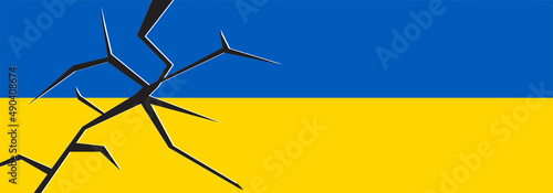 Ukrainian flag on the background of military attributes.