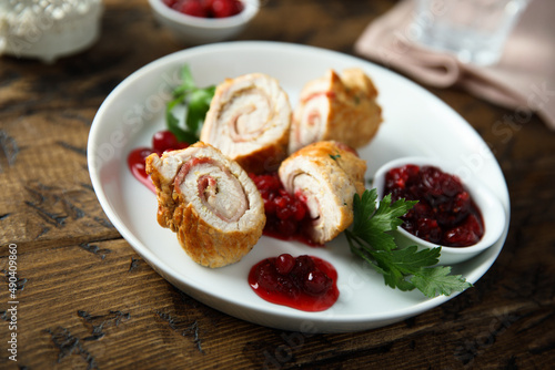 Homemade chicken rolls with cranberry sauce