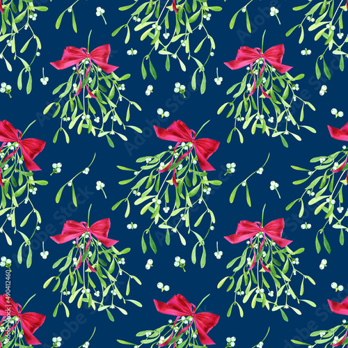 Watercolor red bow with misletoe bouquet. Dark blue background. White berries. Christmas print for wrapping paper, fabric and holiday decor background photo