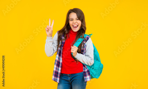 september 1. happy childhood. child with school bag. successful teen girl carry backpack.