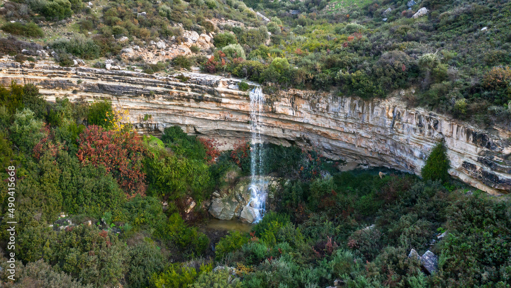 Waterfall of Prasteio Avdimou on a seasonal river in Cyprus filled with water in winter months