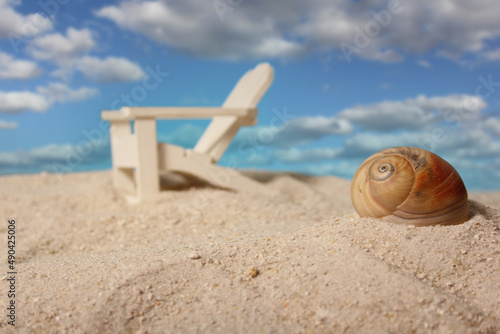 Sea Shell and Beach Chair, Shallow DOF, Focus on Shell