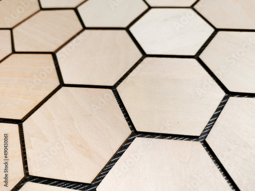For background purpose. Close up image a bunch of wooden hexagon.