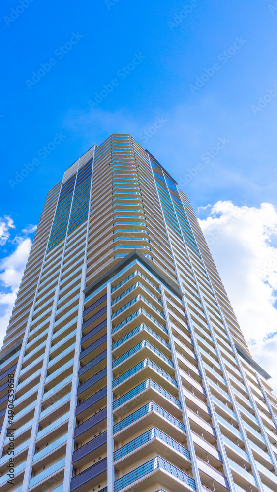 Exterior of high-rise condominium and refreshing blue sky scenery_w_43