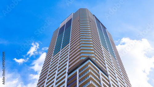 Exterior of high-rise condominium and refreshing blue sky scenery_w_42