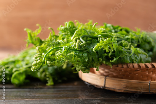 Asian Edible fern or fiddlehead fern from local farmer market, Healthy Leaf vegetable in spring season