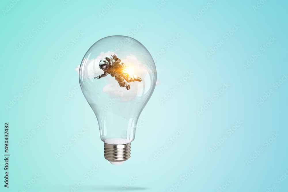 Spaceman inside light bulb . Mixed media Spaceman inside light bulb . Mixed media