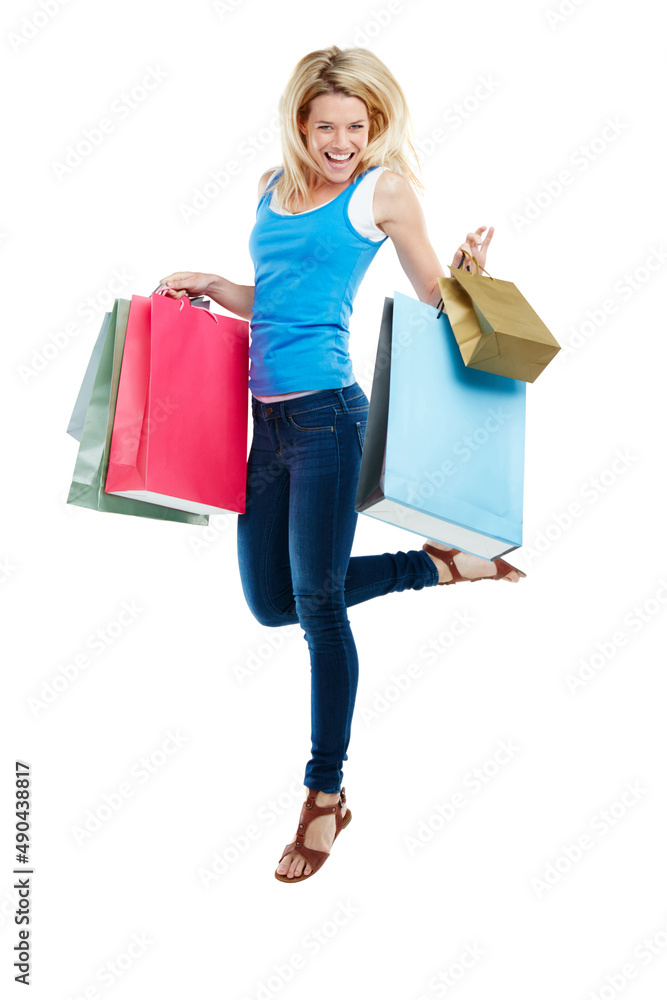 In my defence, I was left unsupervised. Studio shot of an attractive young woman holding shopping bags. In my defence, I was left unsupervised. Studio shot of an attractive young woman holding shopping bags.