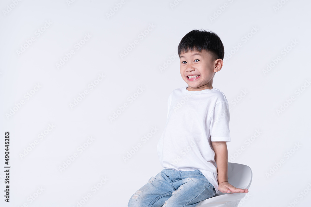 Asian boy with cute smile as happy kid concept Asian boy with cute smile as happy kid concept