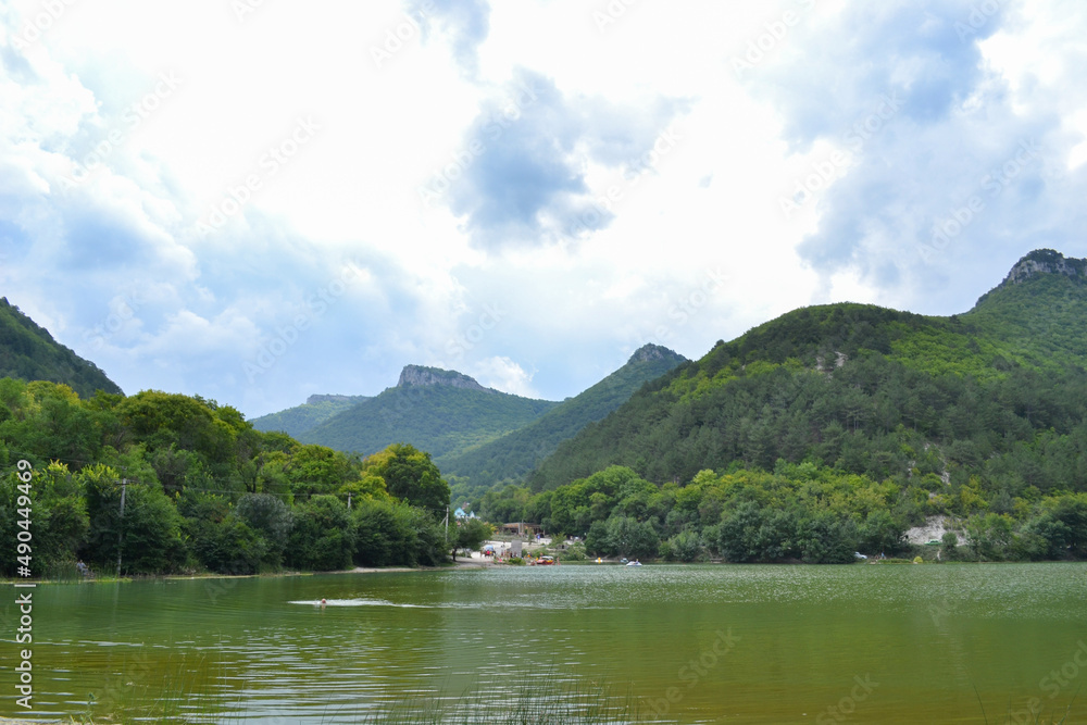 lake in the mountains with a sky