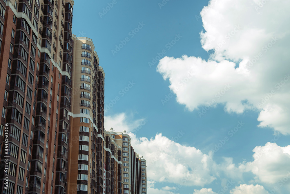 Multi-storey building on a background of blue sky