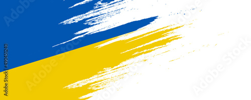 Ukraine Flag with Brush Concept. Flag of Ukraine in Grunge Style. Pray for Ukraine. Hand Painted Brush Flag of Ukraine Country photo