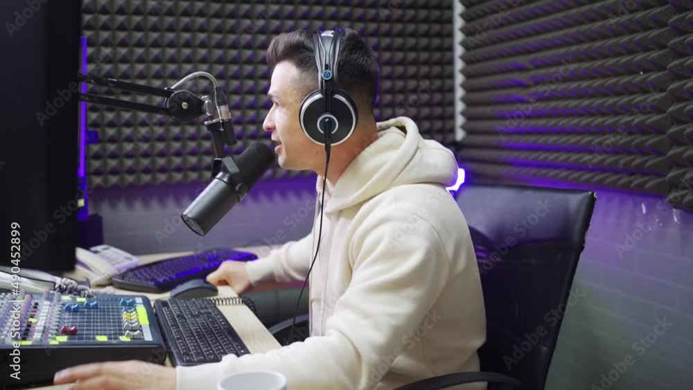professional radio host with headphones on his head professional radio host with headphones on his head