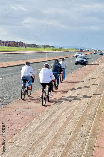 A Coastal Cycle Lane with Cyclists, UK.