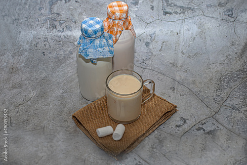 Kefir, fermented baked milk or yogurt with probiotics. photo