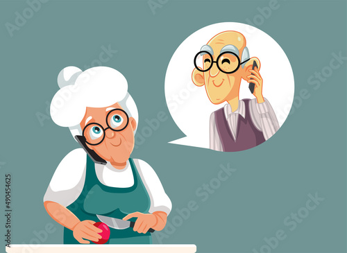Senior Woman Cooking Talking to Husband Over the Phone