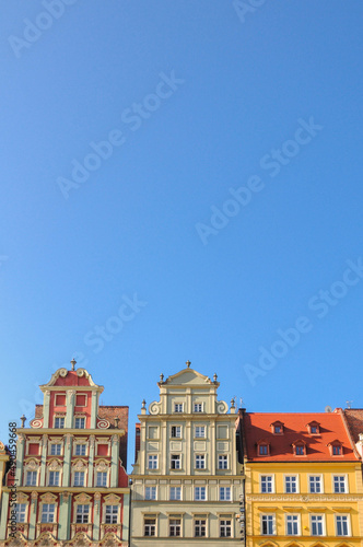 Roofs of Wroclaw central market square (Rynek) in Wroclaw old historic town with old colorful buildings. Famous touristic destination. Beautiful architecture. Space for text.