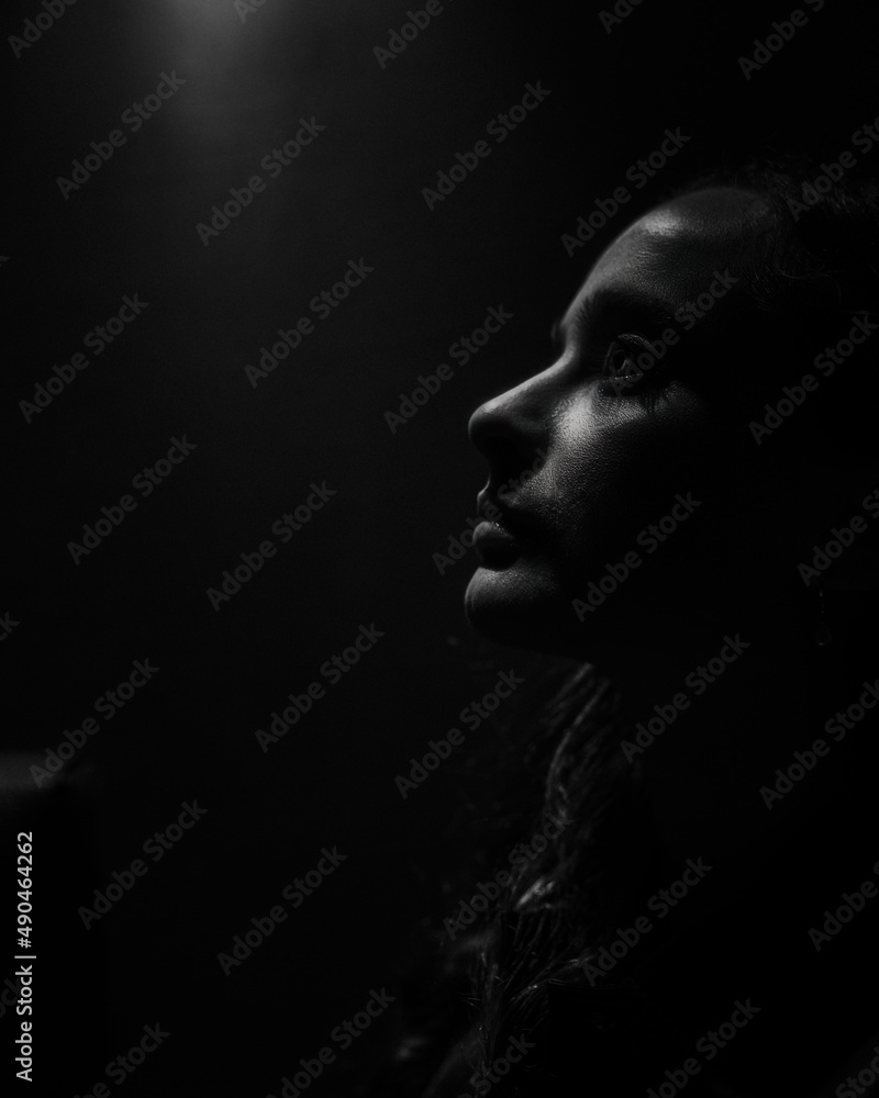 Portrait of girl in black and white, with shadow and illumination to the face. Portrait of girl in black and white, with shadow and illumination to the face.