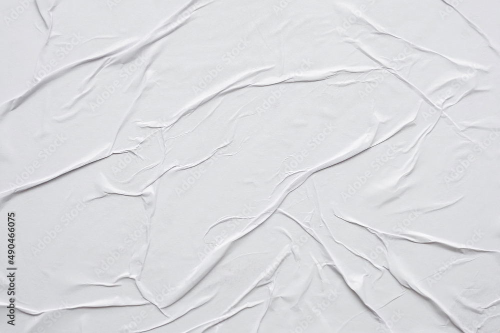Blank white crumpled and creased paper poster texture background Blank white crumpled and creased paper poster texture background