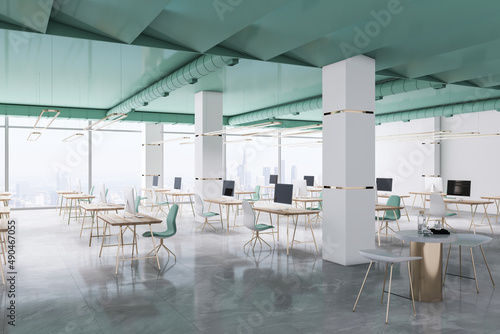 Modern concrete and wooden coworking office or classroom interior with equipment  furniture and computer monitors. Design and workplace concept. 3D Rendering.