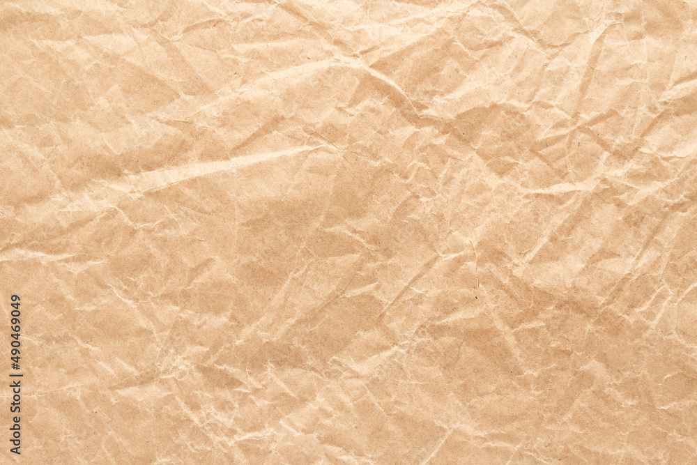 Fototapeta premium Brown wrinkle recycle paper background
