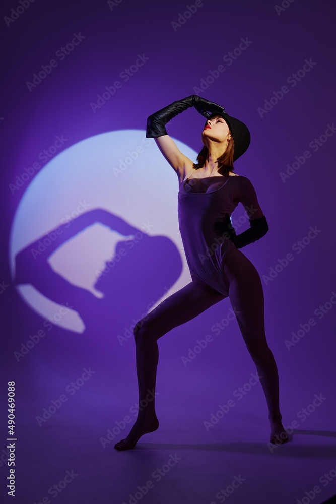 Beauty Fashion woman posing on stage spotlight silhouette disco color background unaltered